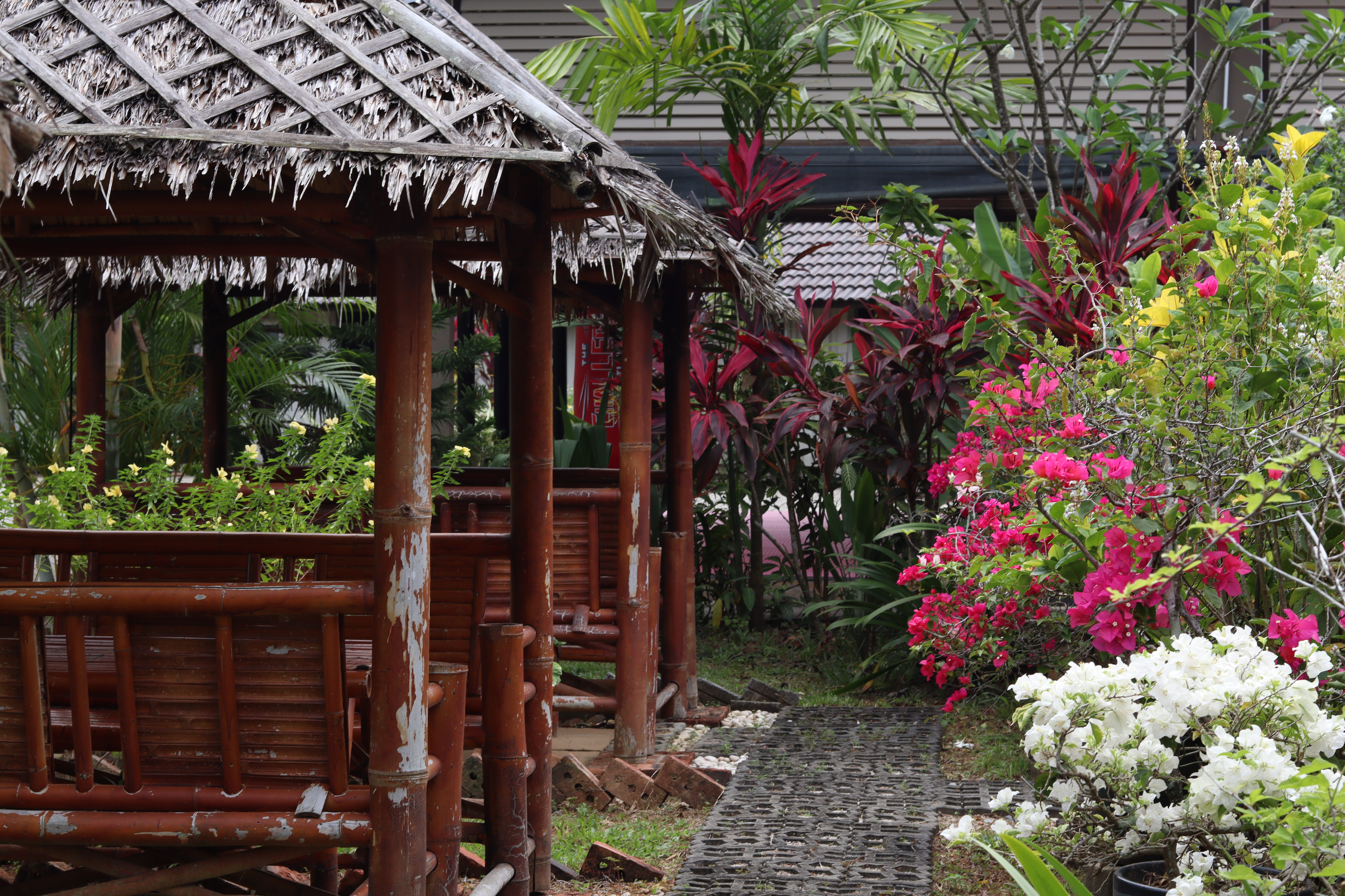 Outdoor seating and relaxation area at Bambu compound