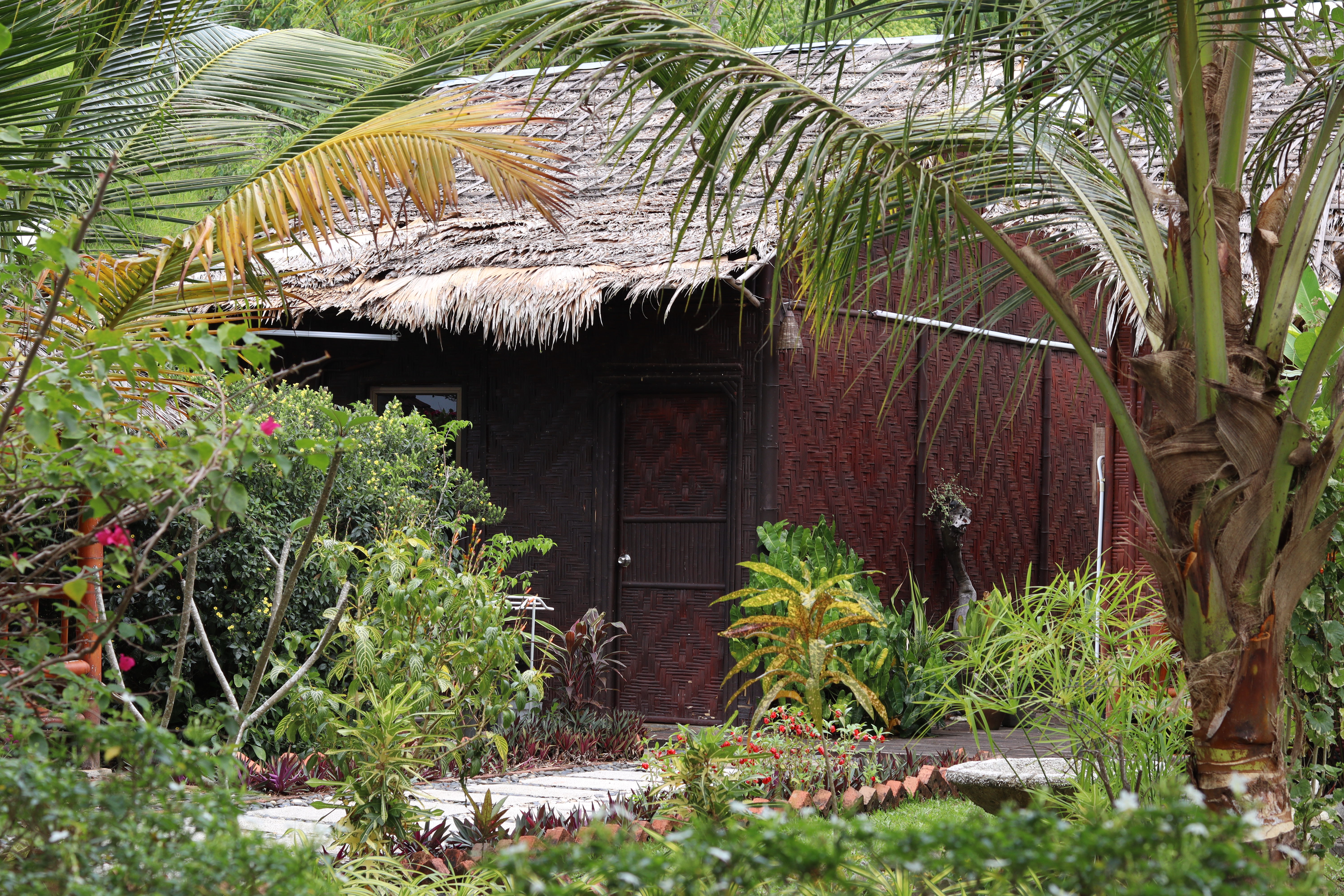 Bambu Villa exterior with tropical garden